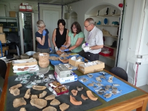 Friends of Castleshaw Roman forts visit to see material from the 1907-8 excavations at Manchester Museum