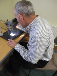 Studying Roman enamels under a binocular microscope